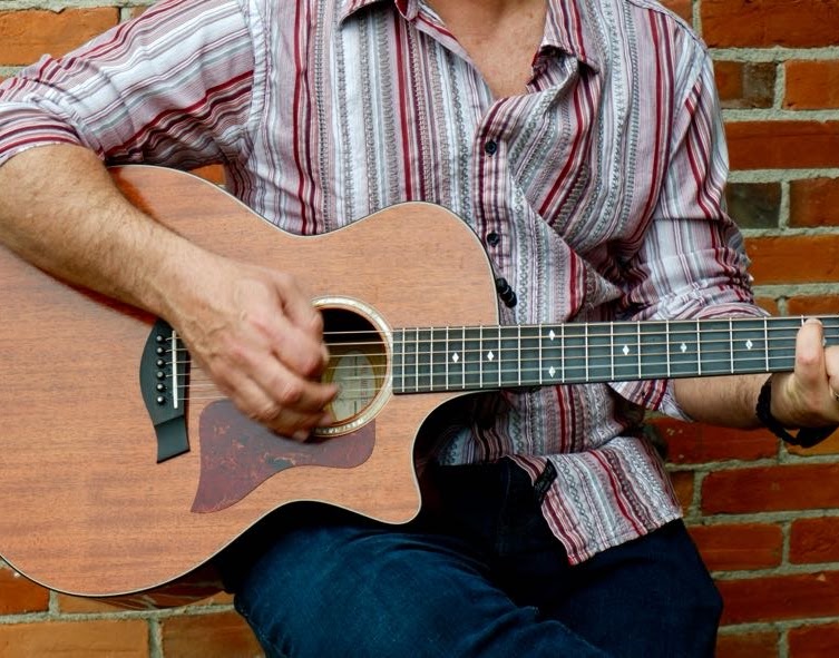 Henry Winter performing acoustic music